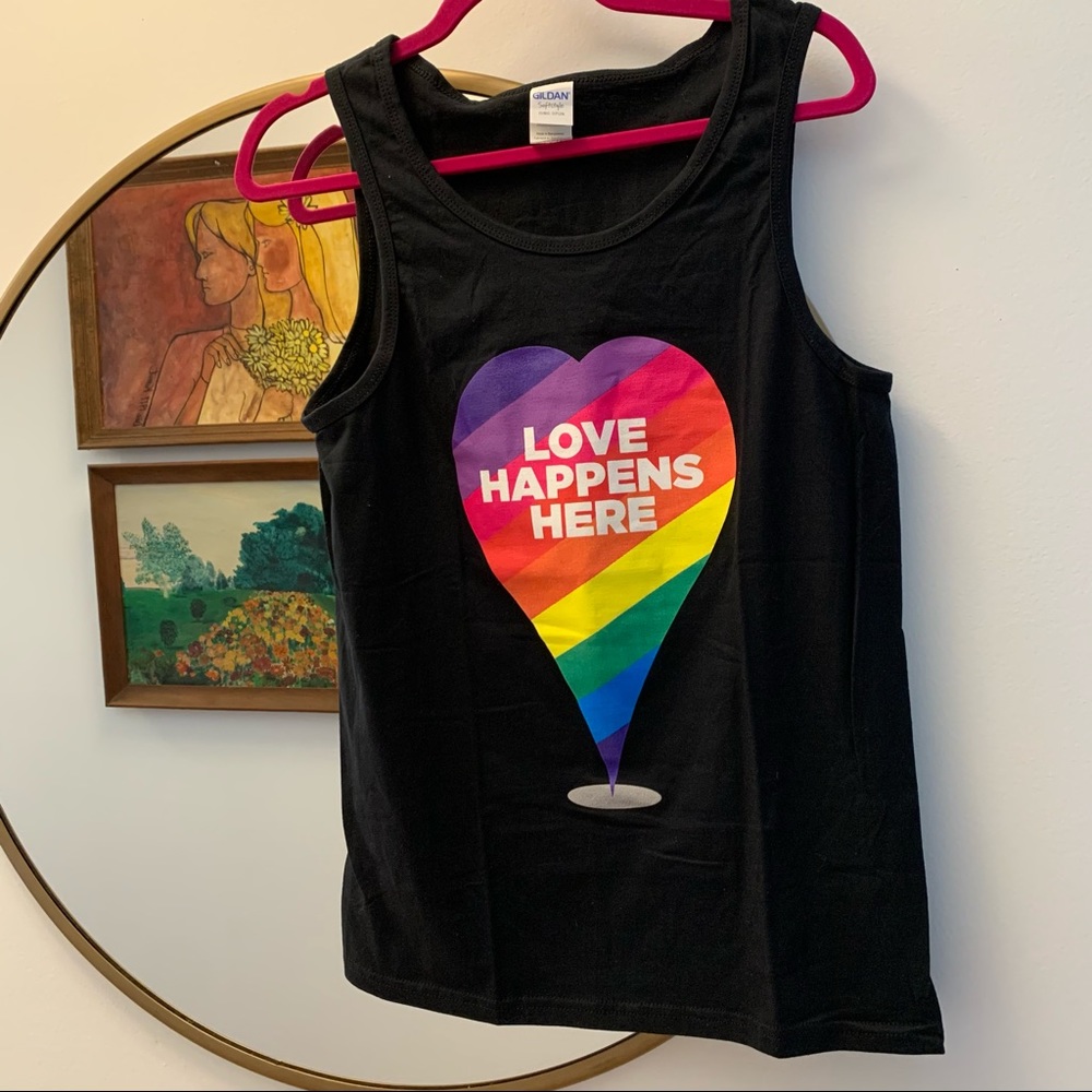 Unisex Love Happens Here tank top
